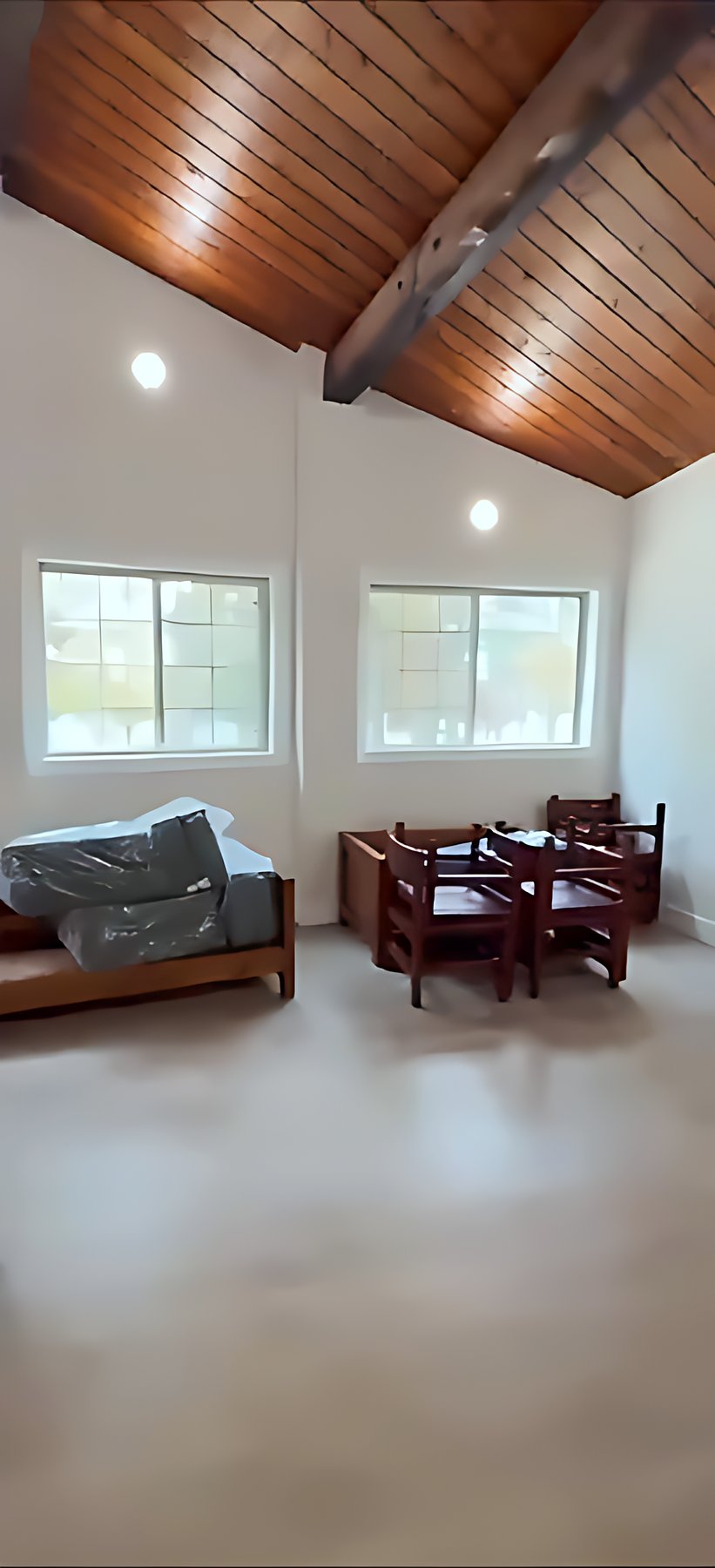 Great room with wood ceiling and new flooring